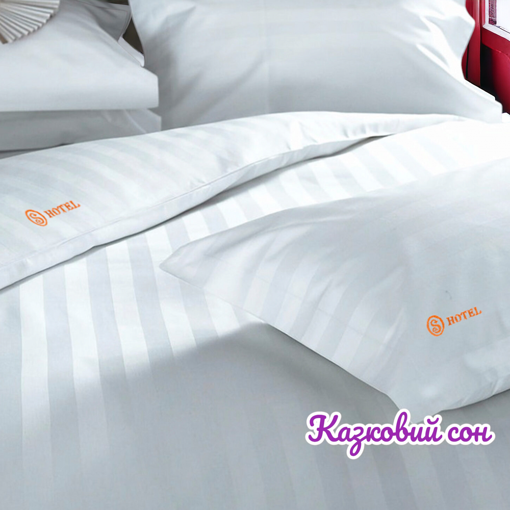 Set of bed linen with embroidered monogram (hotel)